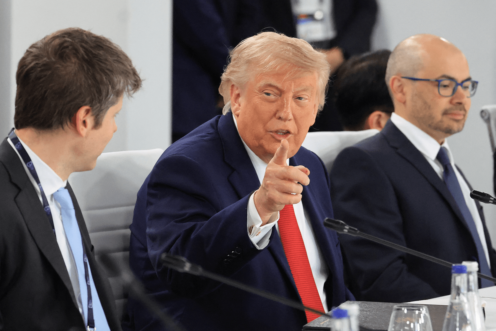 U.S. President Donald Trump speaks with Open AI CEO Sam Altman.